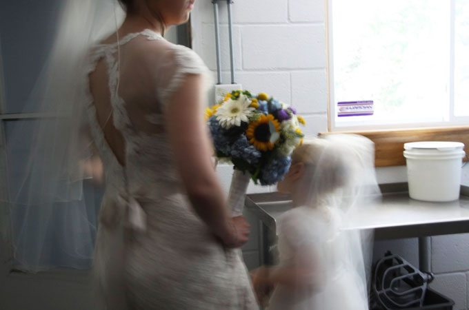 bride and flower girl / photo by Mark Rawlings